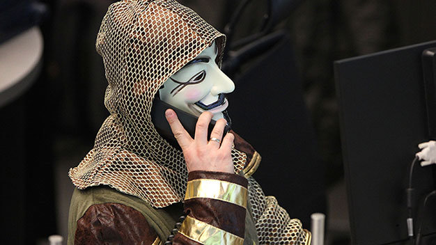 Nhóm tin tặc Anonymous thường xuất hiện thời gian gần đây - Ảnh: AFP