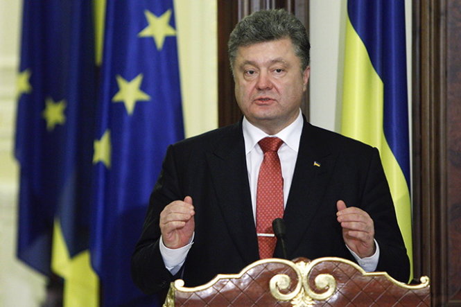 Tổng thống Ukraine Petro Poroshenko nói hòa đàm sẽ được nối lại ở Minsk trong tuần này - Ảnh: Reuters