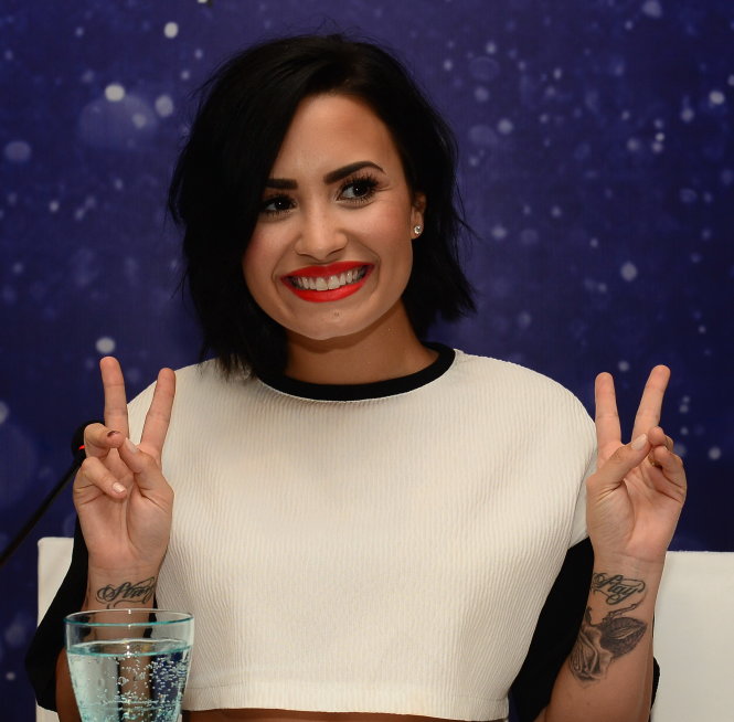 Ca sĩ Demi Lovato tại buổi họp báo chiều 8-5 Ảnh: QUANG ĐỊNH