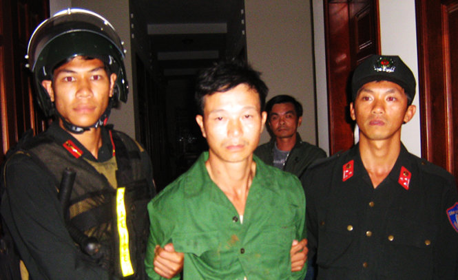 Vũ Văn Đản (giữa), hung thủ đã gây ra vụ thảm án khiến bốn người tử vong - Ảnh THÁI BÁ DŨNG