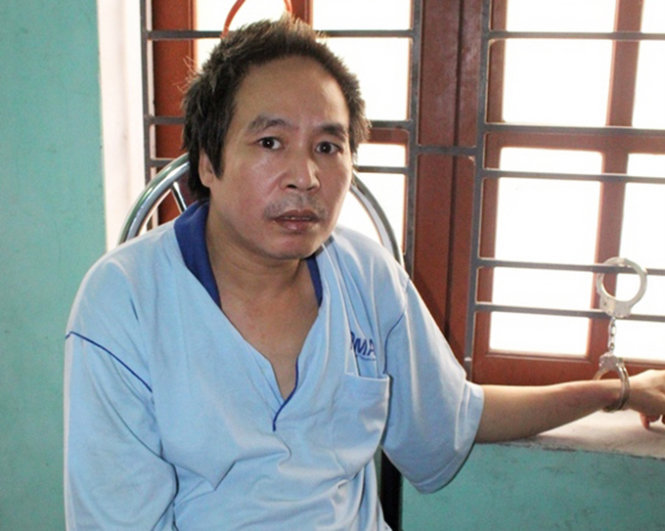 Nguyễn Văn Doanh tại cơ quan điều tra sau khi đâm chết cô giáo