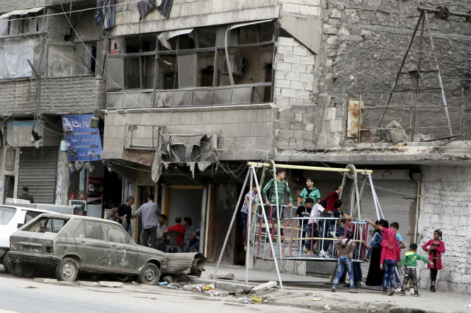 Cảnh hoang tàn ở Al-Fardous, ngoại ô TP Aleppo, Syria ngày 27-9 - Ảnh: Reuters