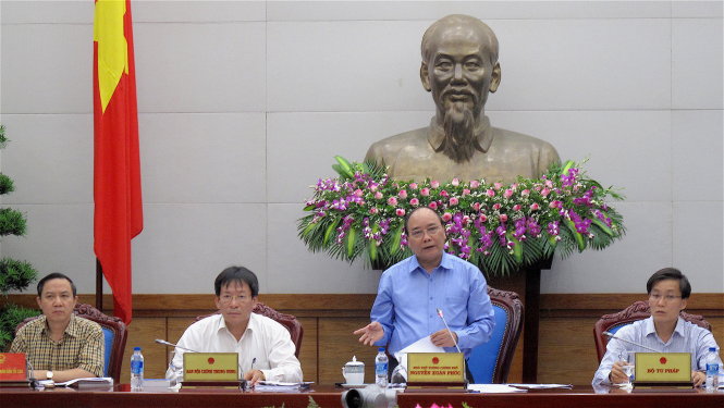 Phó thủ tướng Nguyễn Xuân Phúc tại cuộc họp về tháo gỡ vướng mắc trong giám định tư pháp - Ảnh: V.V.T.