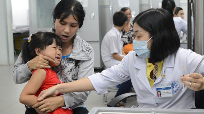 Tiêm ngừa cúm cho trẻ tại Viện Pasteur TP.HCM - Ảnh: T.T.D.