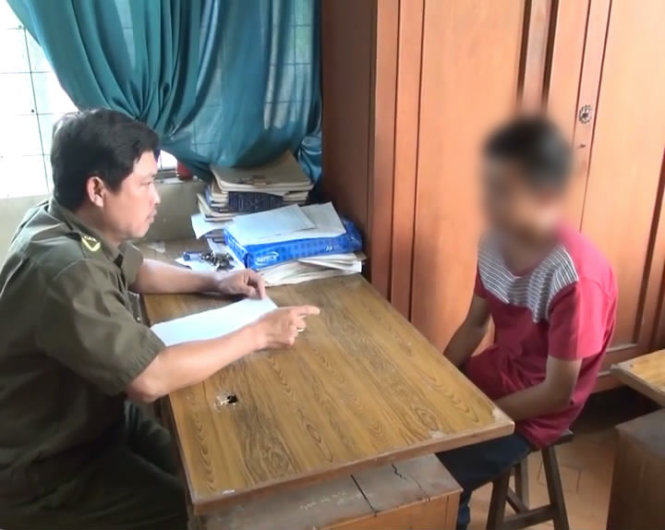 Nghi can Huỳnh Thiện Quang tại cơ quan Công an