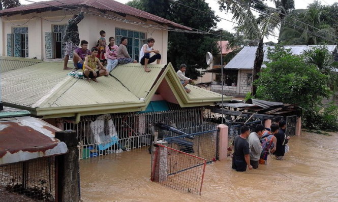 Nước ngập nghiêm trọng ở tỉnh  Nueva Ecija - Ảnh: AFP