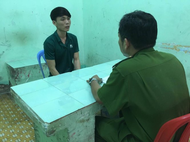 Huỳnh Anh Tuấn tại công an quận 1 - Ảnh: Mỹ Thương