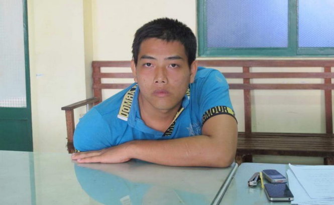 Minh đang bị tạm giữ tại cơ quan điều tra Công an Q.10 - Ảnh: Đức Thanh