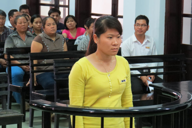 Lê Thị Minh Trang tại phiên tòa sơ thẩm lần thứ nhất hồi tháng 8-2014 - Ảnh: Duy Thanh
