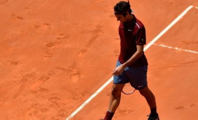 Federer trong trận thua Thiem. Ảnh: Getty Images