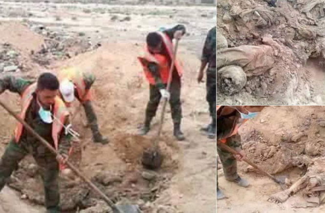 Binh sĩ Syria đang khai quật các xác chết - Ảnh: RT/Twitter
