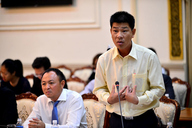 Ông Lê Hữu Nghĩa - Giám đốc Công ty Lê Thành phát biểu trong buổi làm việc giữa lãnh đạo thành phố và hiệp hội bất động sản TP.HCM sáng 6-6 -- Ảnh: QUANG ĐỊNH