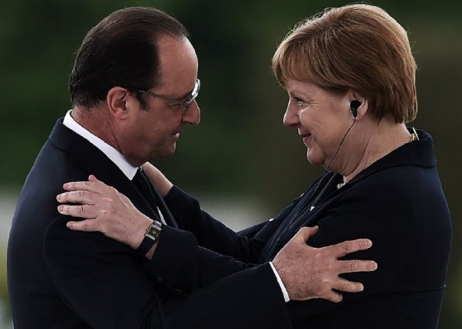 Tổng thống Pháp Francois Hollande và thủ tướng Đức Angela Merkel tại một sự kiện ở miền đông bắc nước Pháp ngày 29-5-2016 - Ảnh: AFP