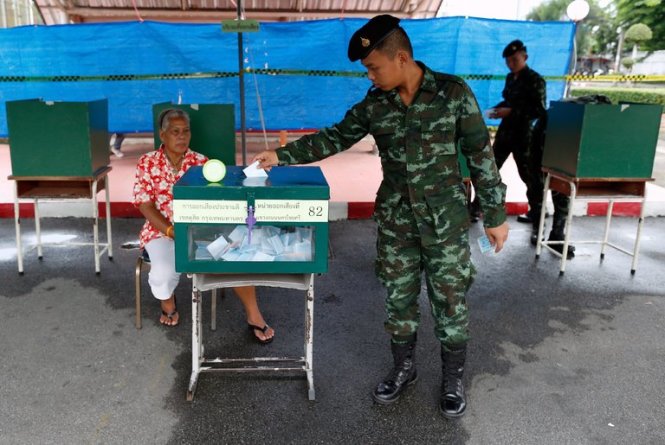 A Thai soldier voted in Bangkok on Sunday. The country’s military, in power since a 2014 coup, asked citizens to approve a new constitution and give it the right to appoint a 250-member Senate.