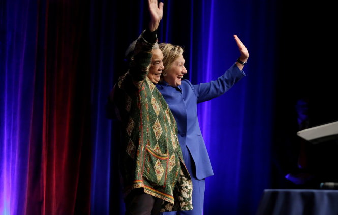 Hillary Clinton and Marian Wright Edelman, founder of the Children's Defense Fund, wave before Clinton speaks to the group in Washington, U.S., November 16,