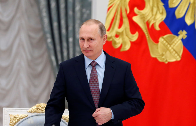 Tổng thống Vladimir Putin tham dự một cuộc họp ở Điện Kremlin ngày 25-11 - Ảnh: Reuters