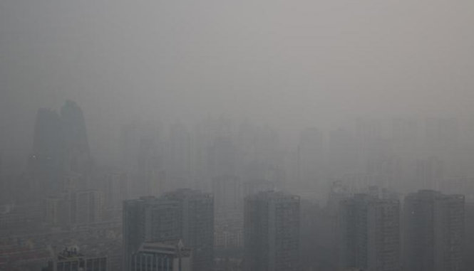 Một ngày ô nhiễm không khí tăng cao tại Bắc Kinh - Ảnh: Reuters