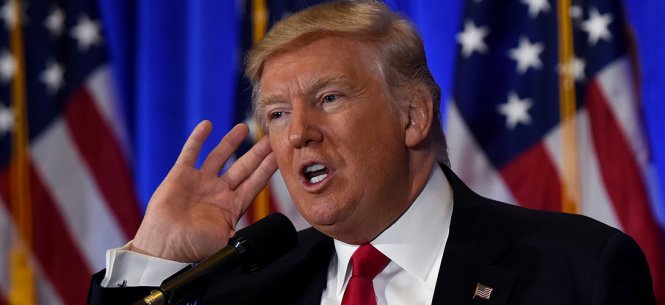 Tổng thống đắc cử Donald Trump trong cuộc họp báo ngày 11-1 - Ảnh: AFP