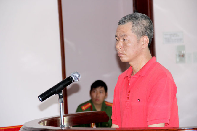 Ghen tuông giết người Đặng Chí Công bị xử phạt 12 năm tù - Ảnh: HUY PHÁCH