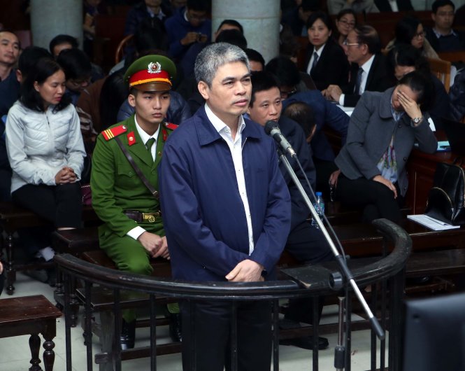 Bị cáo Nguyễn Xuân Sơn, nguyên tổng giám đốc OceanBank, tại phiên tòa xét xử Ảnh: Phạm Kiên - TTXVN