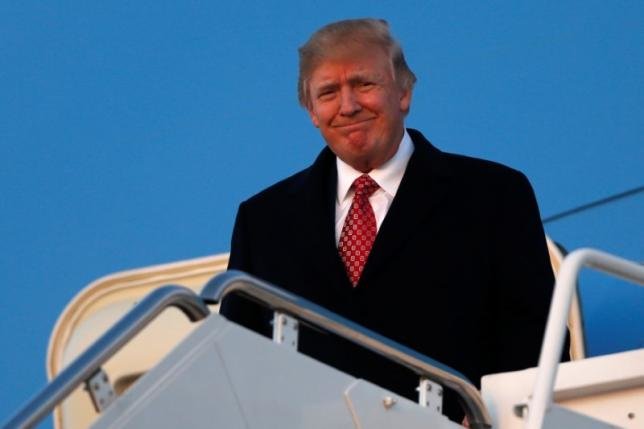 Tổng thống Mỹ Donald Trump lại bị phản ứng khi ban hành sắc lệnh nhập cư sửa đổi - Ảnh: Reuters