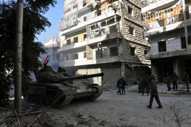 Lực lượng quân đội của chính quyền tổng thống Syria Bashar al-Assad tại thành phố Aleppo năm 2014 - Ảnh: Reuters