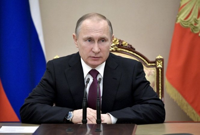 Tổng thống Nga Vladimir Putin tổ chức cuộc họp với các thành viên của Hội đồng An ninh Nga tại Moscow hôm 31-3 - Ảnh: AFP
