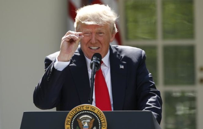Tổng thống Mỹ Donald Trump: “Để thực hiện nhiệm vụ cao cả bảo vệ đất nước và người dân Mỹ, tôi quyết định rút Mỹ khỏi Thỏa thuận Paris về chống biến đổi khí hậu” - Ảnh: Reuters