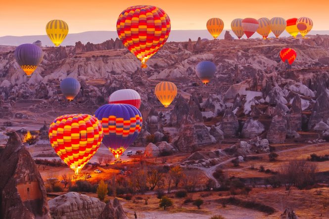 Not many destinations in the world inspire such wanderlust as the Turkish Cappadocia mountains, best enjoyed from a hot air balloon at sunrise © Shutterstock / Symonenko Viktoriia