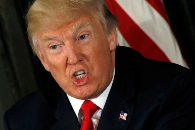 Tổng thống Mỹ Donald Trump nhắc tới Triều Tiên trong một cuộc họp báo liên quan tới thuốc giảm đau tại Bedminster, bang New Jersey ngày 8-8 - Ảnh: Reuters