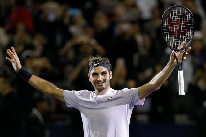 Federer ăn mừng chiến thắng trước Nadal. Ảnh: REUTERS