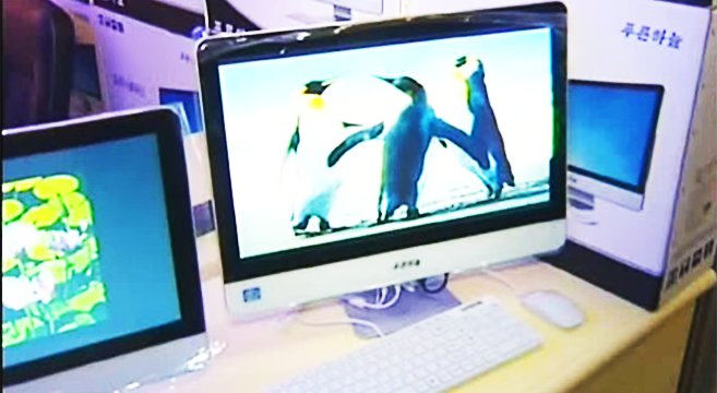 Ảnh chụp lại một máy tính của Triều Tiên bị cho là hàng nhái chiếc iMac của Apple - Ảnh: KCTV