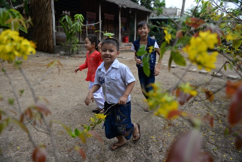 Trẻ con vui tết ở quê Ảnh: Hữu Khoa