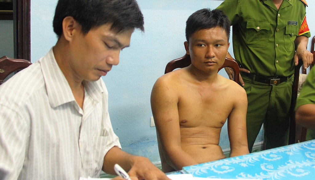 Nguyễn Văn Nghĩa bị bắt tại Công an huyện Phú Lộc vào tối 7-8-2015 - Ảnh: Nguyên Linh