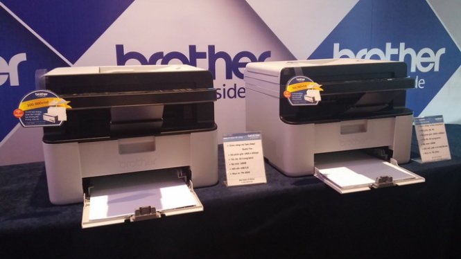 Hai dòng máy in laser đa năng bao gồm quét (scan), fax, photocopy được Brother giới thiệu - Ảnh: Phong Vân