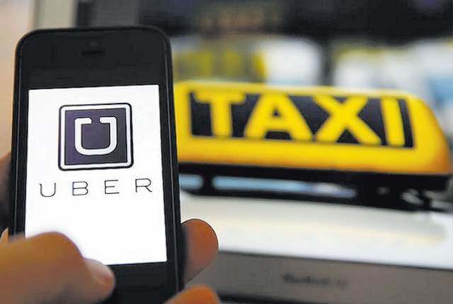 Ảnh minh họa về dịch vụ gọi xe Uber - Ảnh: Reuters
