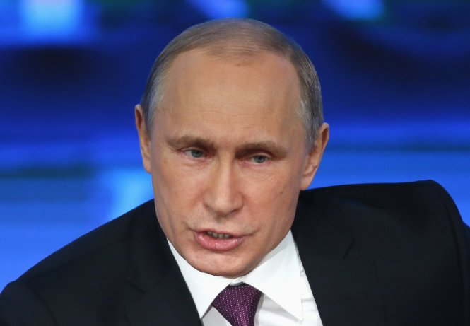 Tổng thống Putin trả lời tại buổi họp báo trưa 18-12 - Ảnh: Reuters