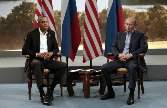 Tổng thống Mỹ Barack Obama (trái) và tổng thống Nga Vladimir Putin trong một cuộc gặp năm 2013 - Ảnh: Reuters