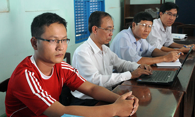 Ông Nguyễn Như Khánh (bìa trái) tại buổi làm việc chiều 2-2 - Ảnh: Đông Hà