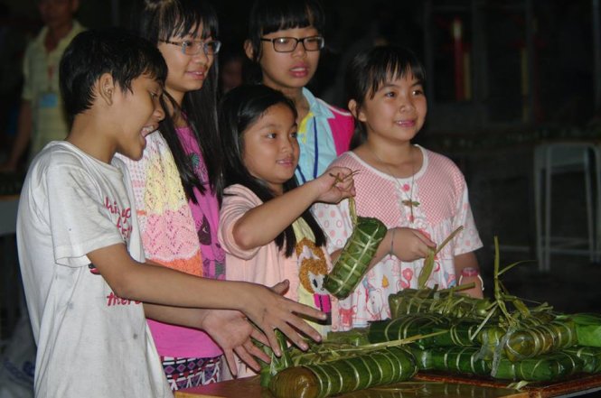 Niềm vui với thành quả - Ảnh: ĐỖ LINH