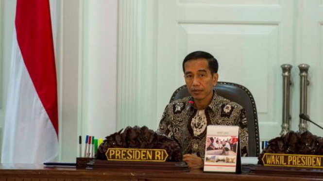 Tổng thống Indonesia Joko Widodo đang dự cuộc họp nội các tại DInh tổng thống ở Jakarta  Ảnh:Reuters