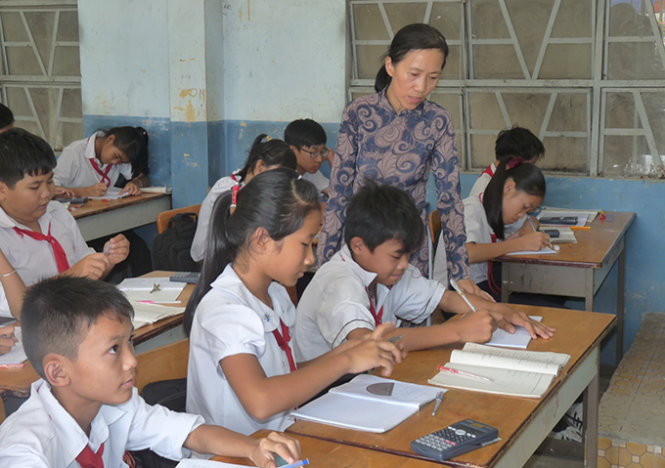 1 tiết học toán của học sinh Trường THCS Phạm Văn Hai, huyện Bình Chánh, TPHCM. Năm nay các trường THCS sẽ tuyển sinh từ 15-6 - Ảnh: H.HG