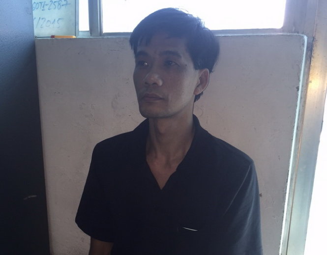Huỳnh Hữu HIếu bị bắt giữ tại Công an Q.1, TP.HCM chiều 11-6 - Ảnh: Gia Minh