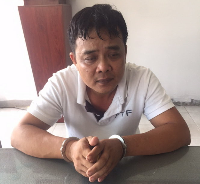 Cao Văn Sang bị bắt giữ tại Công an Q.1, TP.HCM chiều 11-6 - Ảnh: Gia Minh