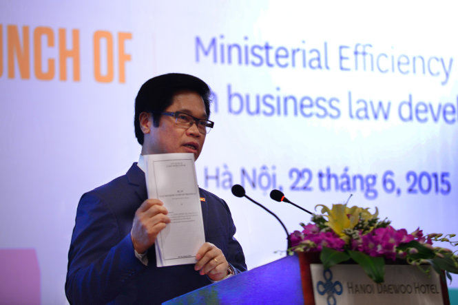 Ông Vũ Tiến Lộc, chủ tịch VCCI, phát biểu tại buổi công bố MEI 2014 - Ảnh: Quốc Tuấn
