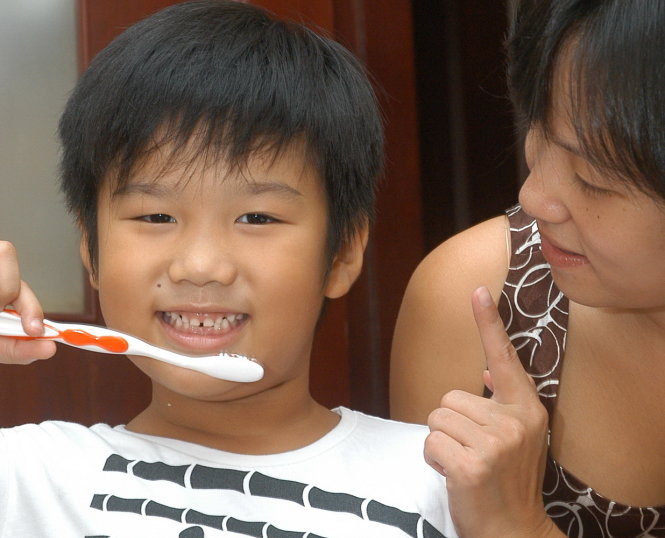 Giúp trẻ có thói quen giữ vệ sinh răng từ bé - Ảnh: T.T.D.