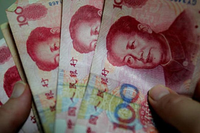 Trung Quốc tiếp tục giảm giá đồng NDT Ảnh: Reuters
