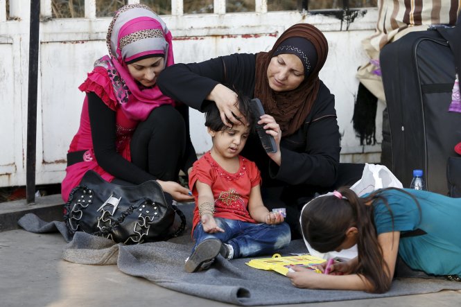 Một gia đình người di cư Syria đang ở Lebanon chờ ngày sang Thổ Nhĩ Kỳ và tiếp đó là châu Âu. Ảnh: Reuters