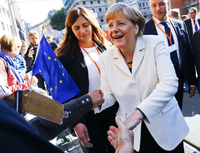 Thủ tướng Đức Angela Merkel được ca ngợi với chính sách mở cửa với người tị nạn - Ảnh: Reuters
