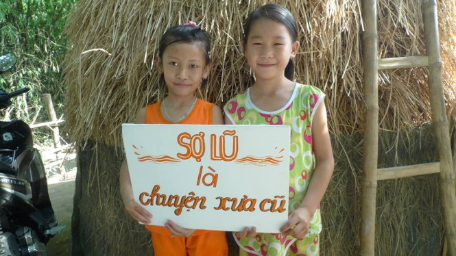 Khẩu hiệu của những người thực hiện dự án Nhà chống lũ: Sợ lũ là chuyện xưa cũ!  - Ảnh: NCL